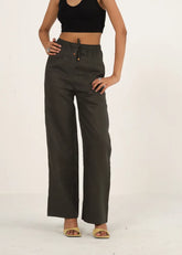 A Model Wearing Green Linen Dark Green Linen Drawstring Straight Pants , curated by Only Ethikal